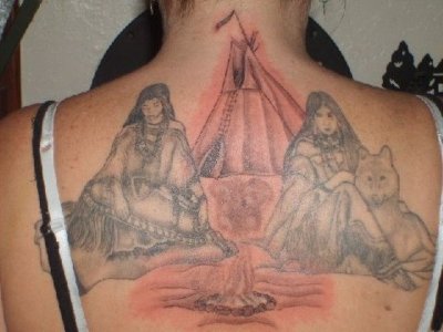 Tattoo on Jeannies back.  The center part that is red was just done.  It will turn to normal after healing.jpg