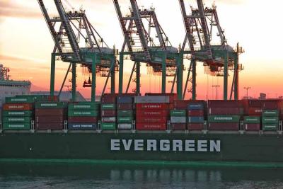 Loaded container ship ready to leave port.