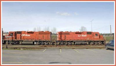 CP engines 3006 and 3010 passing by.