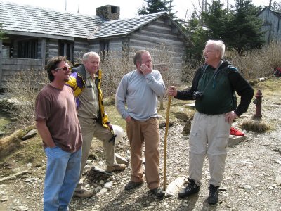 workers talking with Ed Wright