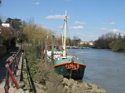 Houseboat, just below the bridge.