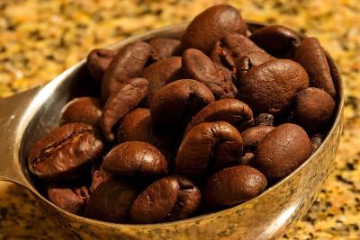 Coffee scoop with beans by Alastair Norcross