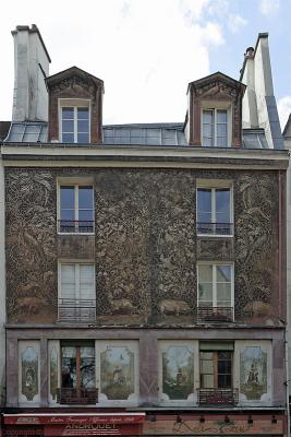 Wild painted facade at N°134 rue Mouffetard