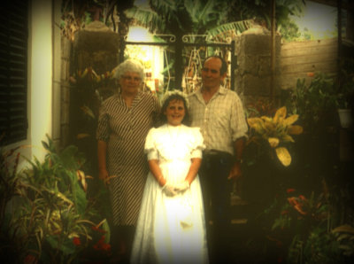 Mecia's first communion with my parents