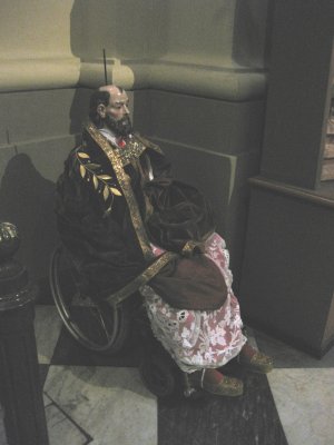 Priest mannequin in wheelchair??