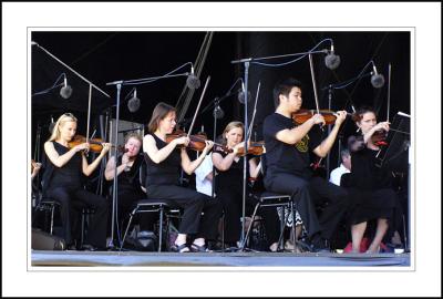 SSO violins rehearsing