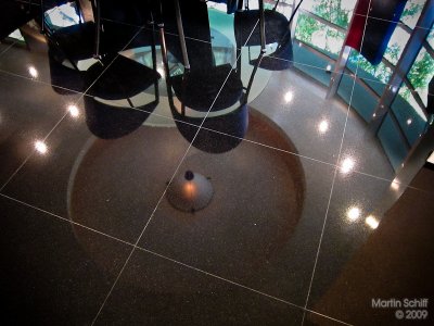 Black granite floor reflections