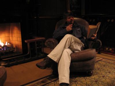Man with Pipe by Fire