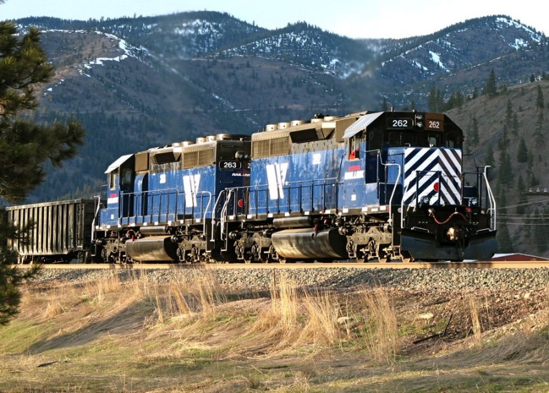 The MRL dirty dirt train with two recently repainted SD40-2XRs prepares to pull east out of Clinton, MT. 04/06/08