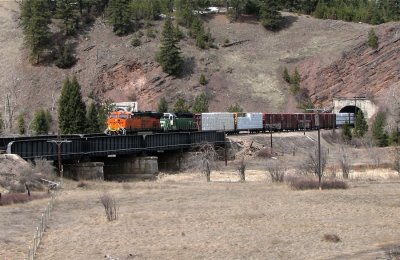 BNSF ES44DC #7604 leads an eastbound over the Clark Fork River west of Nimrod, MT. 04/06/08