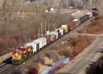 The same westbound BNSF train from above passing the Bearmouth area between Drummond & Clinton, MT. 04/06/08