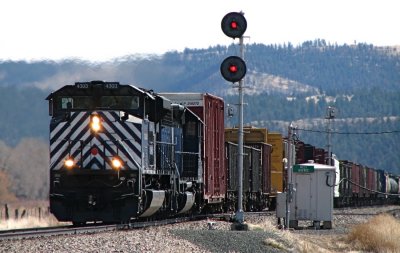 The LM with MRL 4303 and 304 passing the coal train at Quebec, MT. 04/10/08