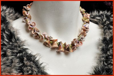 curls of shells, combined with pearls