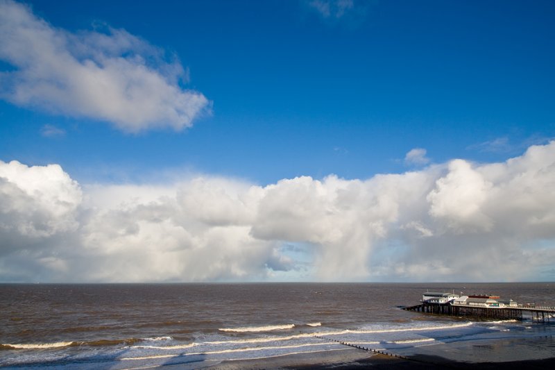 Cromer pier and approaching storm