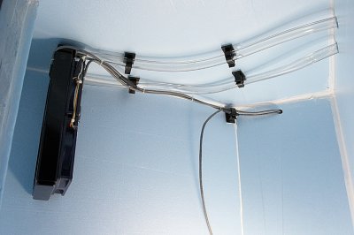 Radiator, fans, tubing, and wires secured