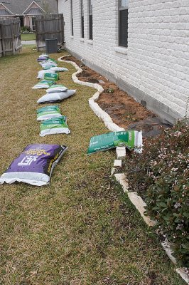 Adding in some rich potting soil