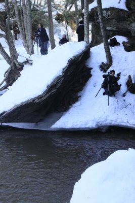 Risking life and limb to photograph Artist's Falls.  How many photographers can you count?