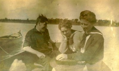 trio in boat - perhaps Muriel center & Elise Baldwin right?