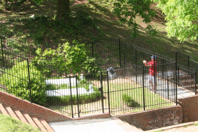 Approaching the site. Red shirt guy was already there. Notice the new monument inside the fence.