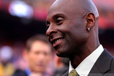 Jerry Rice (foreground) and Steve young (blurred background) - Pro Football HOFers