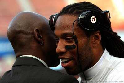 Arizona Cardinals WR Larry Fitzgerald gets a hug from NFL Hall of Famer Jerry Rice