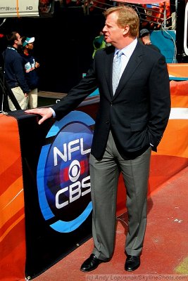 NFL commissioner Roger Goodell and the CBS Sports Logo