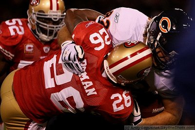 San Francisco 49ers safety Mark Roman makes a tackle