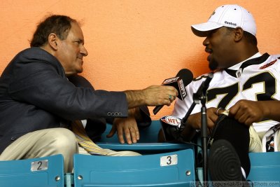 Super Bowl XLIV Media Day: ESPN analyst Chris Berman with New Orleans Saints OG Jahri Evans