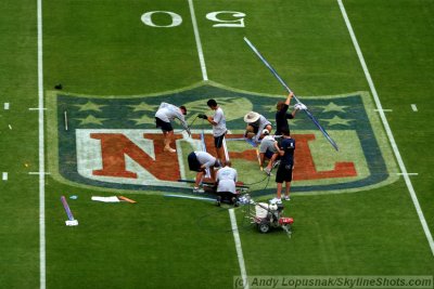 Painting the NFL logo at Super Bowl XLIV