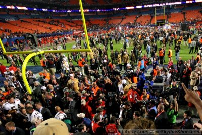 New Orleans Saints head coach Sean Payton takes the Super Bowl trophy for a victory lap