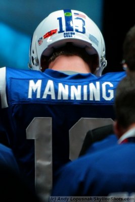 Indianapolis Colts QB Peyton Manning hangs his head low after his team lost Super Bowl XLIV