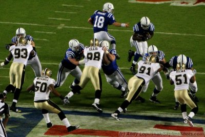 Indianapolis Colts QB Peyton Manning hands off to RB Joseph Addai
