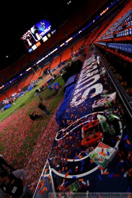 Confetti and trash on the field after Super Bowl XLIV
