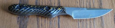 Handle sculpting and mounting by Darrell,  damascus blade made by Two Finger Knife, Llc