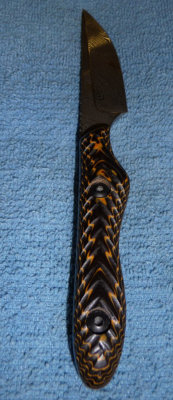 Handle sculpting and mounting by Darrell,  damascus blade made by Two Finger Knife, Llc