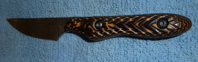 Handle sculpting and mounting by Darrell Taylor,  damascus blade made by Two Finger Knife, Llc