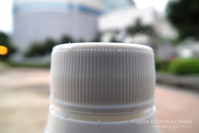 24mm f/2.8 at 1cm object distance (super macro focus range from 1cm-1m)