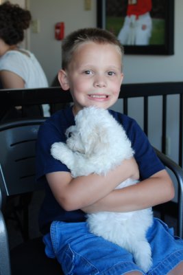 Jonah with our new puppy, Babe