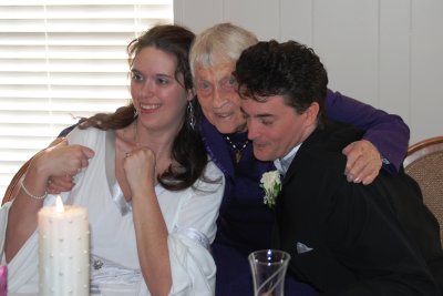 Nanny hugging the newlyweds