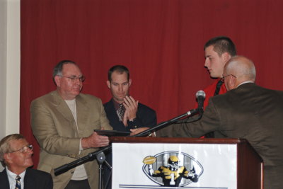 Garrett Davis receiving the Mickey Andrews Defensive Player of the Year Award