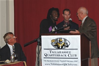 DJ Jones receiving the Amos Godby Scholar Athlete of the Year Award