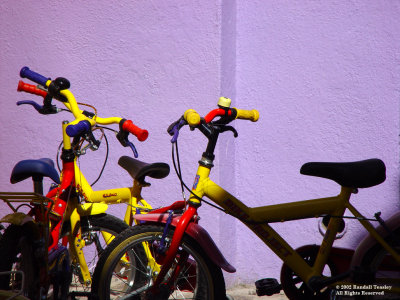 Burano-Bicycles-purple-wall
