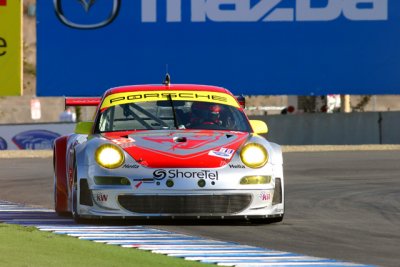 Flying Lizard Porsche accelerating out of T11