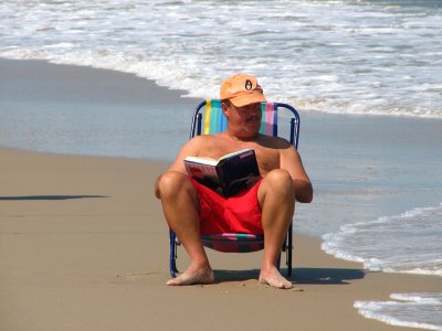 Catching a book and a wave