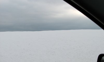 Snowy expanse in Virginia through the car window