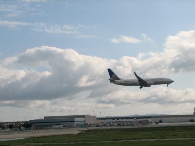 A Continental 737 lands as we start our roll