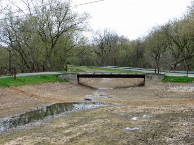 Bridge across canal to parking lot in Hancock