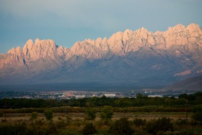 The city of Las Cruces, NM in valley beneath the Organ Mountains