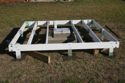 Decking frame supports cemented into place.