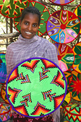 A Tigray woman shows off her handicrafts in Axum.  This picture was chosen as a finalist in the 2007 Atlanta Journal-Constitution Travel Photo Contest, People category.